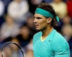 Federer ôm hận trước cừu địch Nadal